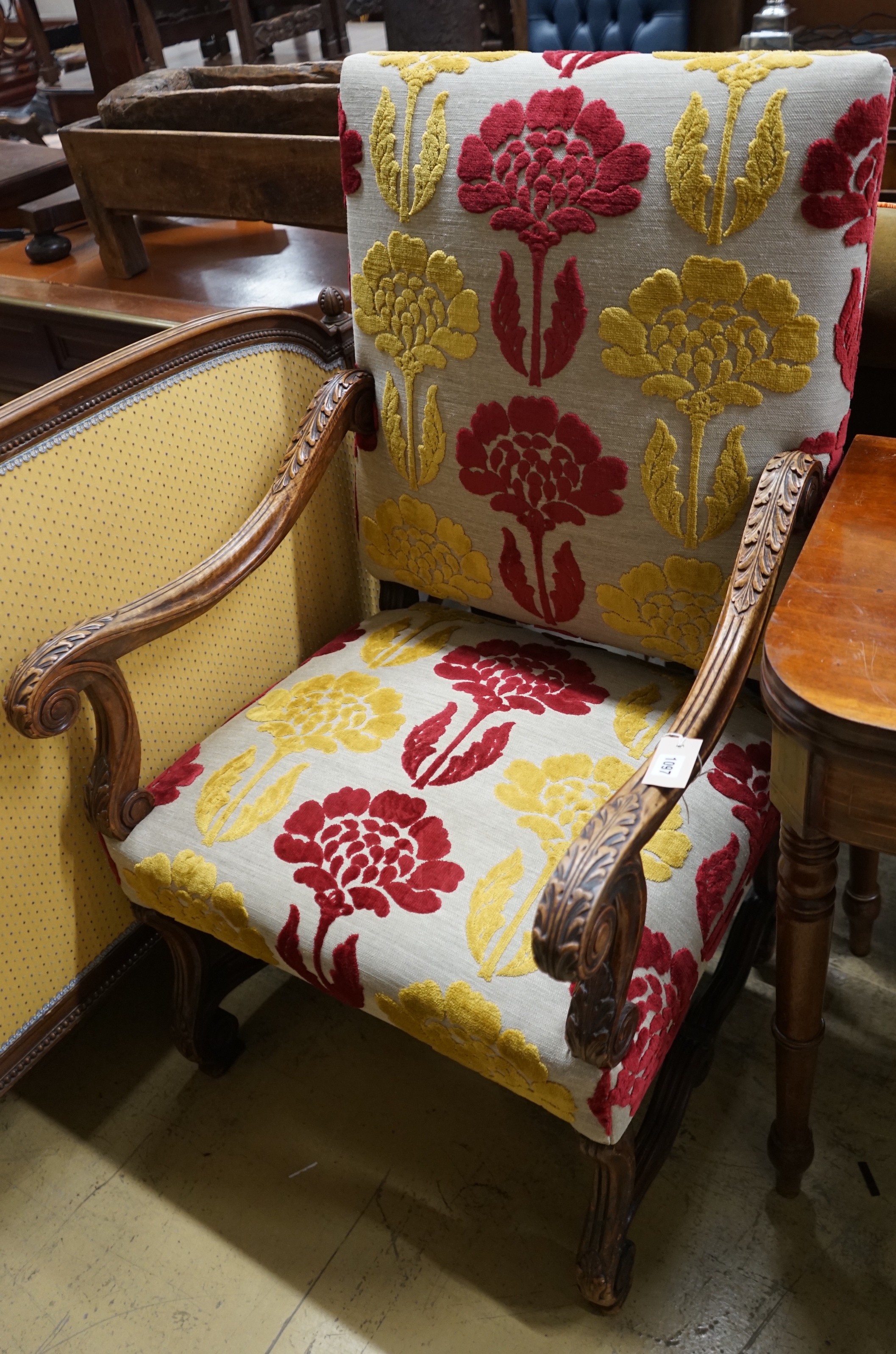 An upholstered Carolean style armchair, width 65cm, depth 56cm, height 114cm